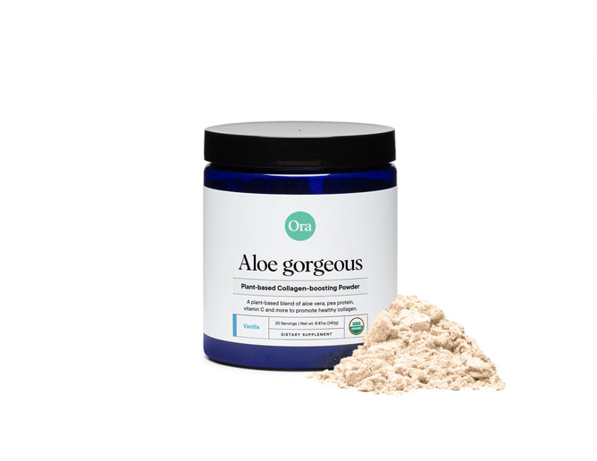 A blue Ora Organic Vegan Collagen-Boosting Powder container with light beige powder beside it, labeled to highlight ethically-sourced aloe vera, pea protein, and vanilla flavor.