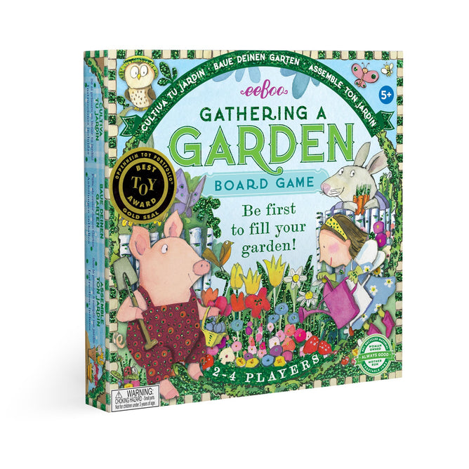The Gathering a Garden Board Game by eeBoo Piece & Love features a colorful box with animals gardening, including a pig and rabbit. For ages 5+, 2+ players, it displays a gold “Best Toy Award” sticker.