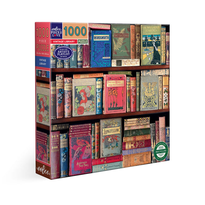 The eeBoo Piece & Love Vintage Library 1000 Piece Jigsaw Puzzle features a colorful Edwardian library illustration, is made from recycled board and FSC-certified paper, and displays eco-friendly icons on the box.