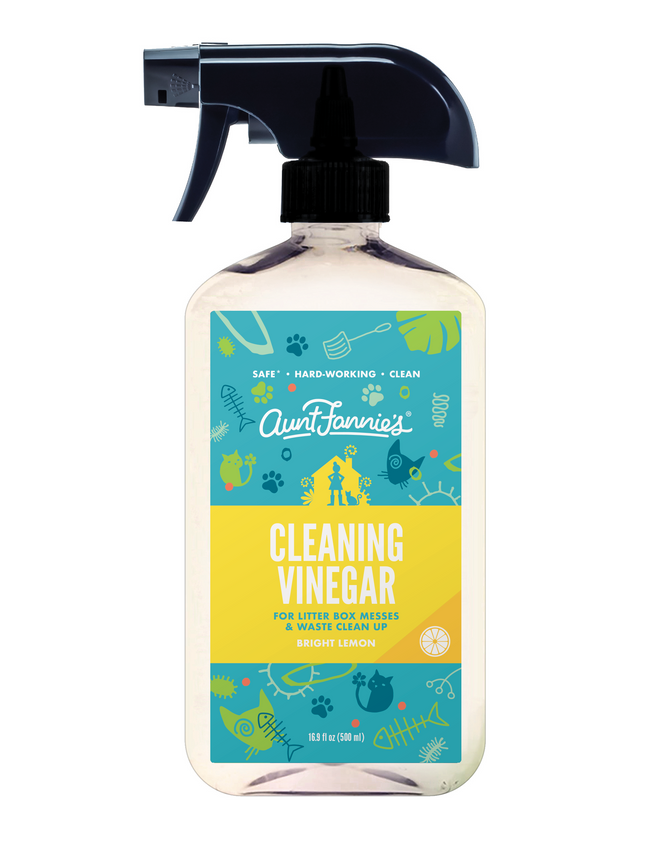 Branded as Aunt Fannies Cleaning Vinegar For Cats, the spray bottle offers a vibrant lemon aroma infused with essential oils. Adorned with pet and cleaning tool illustrations, it provides a safe, plant-based solution for tackling litter box messes and waste.