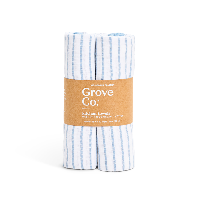 Two Organic Cotton Striped Kitchen Towels from Grove Co., featuring blue and white stripes, come in a brown paper band. Made of 100% organic cotton, they offer quick-drying properties and include details about size and packaging.