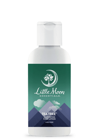 The 4 fl oz (118 ml) Tea Tree Foot Lotion by Little Moon Essentials features a green label with a white moon and tree logo. Infused with tea tree oil, it comes in a bottle with a white flip-top cap, perfect for naturally nourishing your feet.