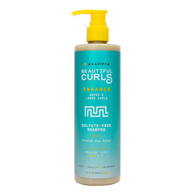 Alaffia Beautiful Curls Curl Enhancing Shampoo in a turquoise pump bottle is perfect for wavy to curly hair. The label states Enhance Waves & Loose Curls and features Unrefined Shea Butter with a Moisture Level. The bottle contains 12 fl oz (355 ml).
