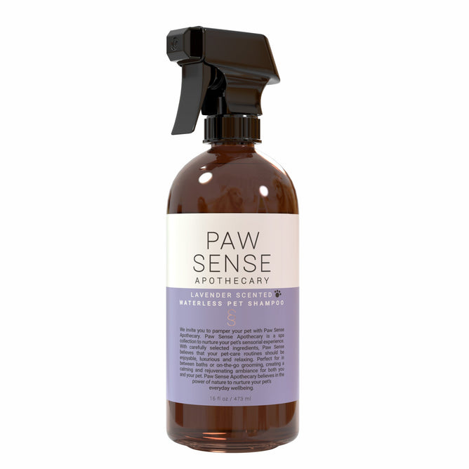 Paw Senses Waterless Pet Shampoo, in a 16 fl oz bottle ideal for dog and cat grooming, has a calming lavender scent. It features a spray nozzle for easy application, and the purple and white label clearly showcases the brand and product details.