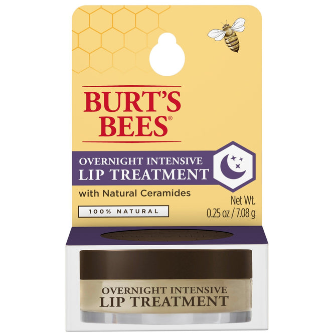 The Burts Bees Overnight Intensive Lip Treatment features packaging with a honeycomb pattern and bee illustration, highlighting its 100% natural healing ingredients. It includes natural ceramides and weighs 0.25 oz (7.08 g), targeting dry, cracked lips.