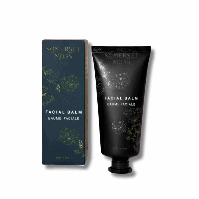 The Somerset Moss Facial Balm comes in a dark green 50 ml (1.7 oz) tube with a matching box, adorned with delicate floral illustrations and highlighted white text. Enriched with omega-rich ingredients and nourishing carrot seed oil for radiant skin.
