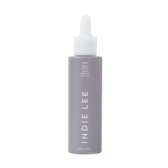 Indie Lees Daily SPF Primer is a sleek light gray 40 ml (1.36 fl oz) bottle of broad-spectrum SPF 50 sunscreen with a dropper cap. Featuring niacinamide, the brand name stands proudly on the left, and this primer could be your perfect skincare finale with its sun protection benefits.