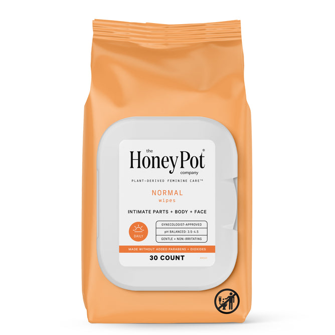 The Honeypot Companys Intimate Wipes - Normal come in an orange pouch, labeled for use on intimate parts, body, and face. Each pack includes 30 gynecologist-approved wipes supporting vaginal pH balance and is paraben-free.