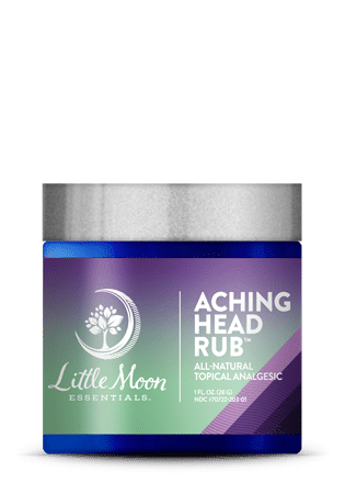 A jar of Little Moon Essentials Get A’Head Rub is a soothing, all-natural analgesic with essential oils for cooling relief. It features a blue container with a silver lid and a white logo and text on a gradient background.