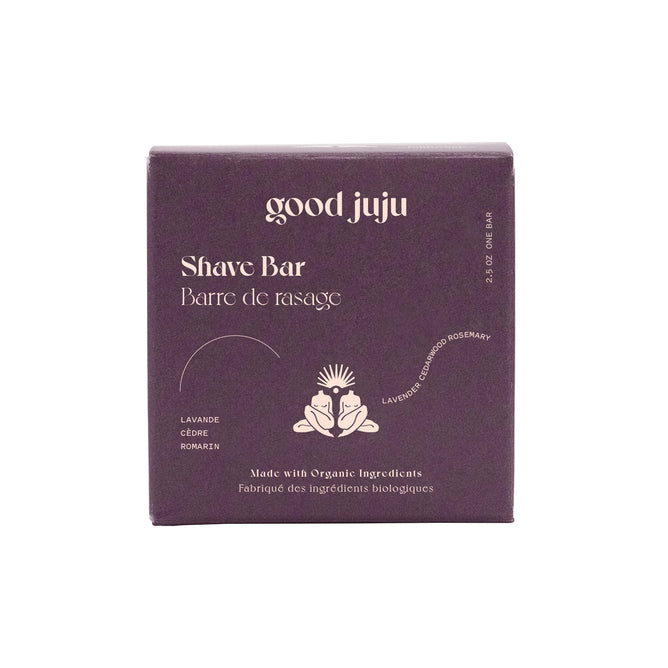 The Moisturizing Shave Bar by Good Juju Body & Home features purple circular packaging with English and French text, emphasizing its organic ingredients and skin-nourishing oils. This zero-waste product is as gentle on the Earth as it is on your skin.