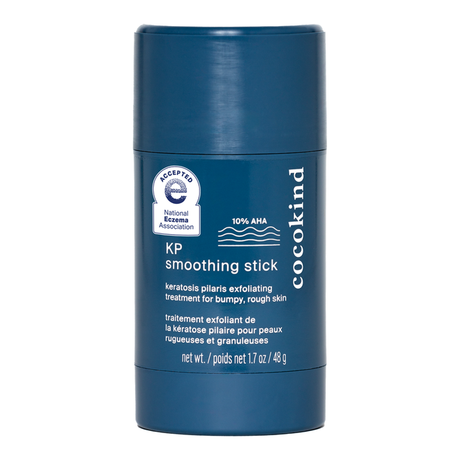 The blue, cylindrical Cocokind KP Smoothing Stick with 10% AHA is highlighted as an effective keratosis pilaris treatment, offering exfoliating benefits for rough skin, and proudly displays the National Eczema Association acceptance seal.