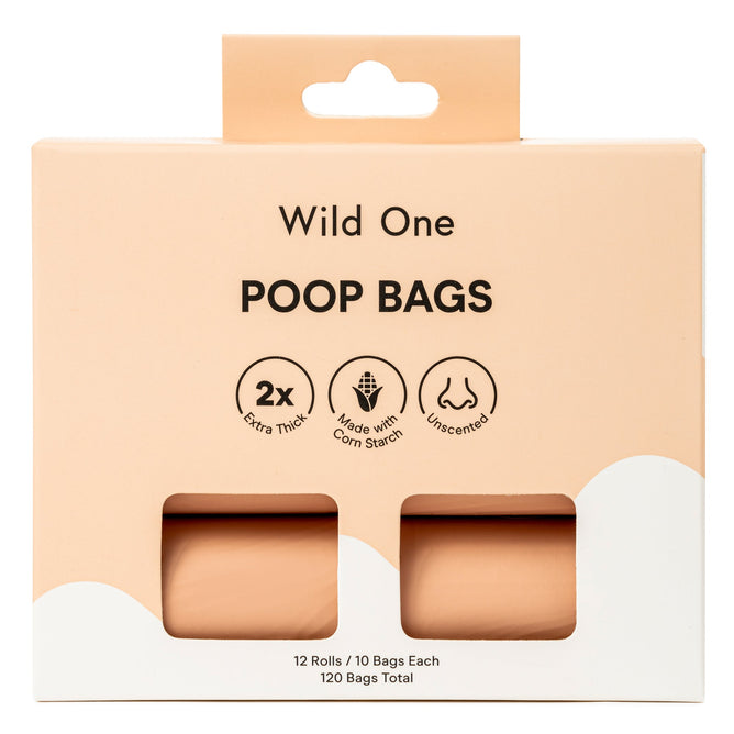 The Wild One peach-colored Leakproof Dog Poop Bags box contains two unscented rolls made with corn starch, boasting 2x Extra Thick and eco-friendly. With 12 rolls of 10 bags each, enjoy 120 reliable, leak-proof solutions for any mess.