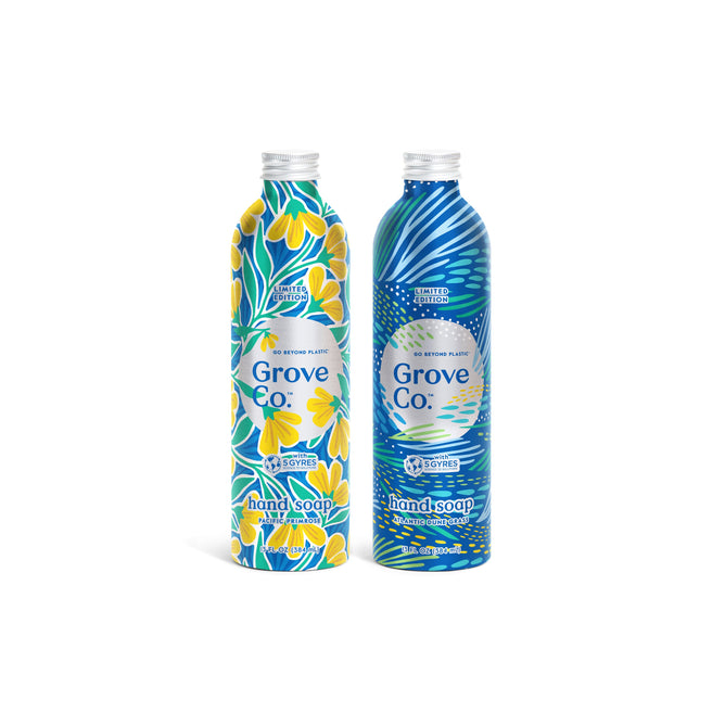 Two bottles of Grove Collaboratives Hand Soap Set - Spring Collection are shown: the left has a yellow floral design, Pacific Primrose, and the right a blue leafy design, Atlantic Dune Grass. Both are limited edition and made from 100% recyclable materials.