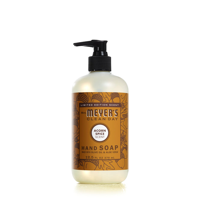 Mrs. Meyers Acorn Spice Hand Soap features a 12.5 fl oz bottle with a pump and decorative acorn and leaf designs, highlighted by the Acorn Spice Scent and Limited Edition Scent text.