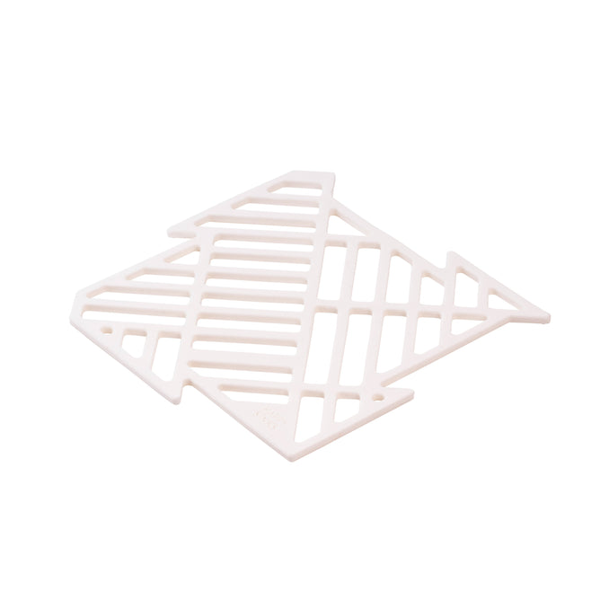 The Puzzle Sink Mat by HAPPY SiNKS is a kitchen essential featuring a fish-shaped design with geometric cut-out patterns, crafted from durable and food-grade white silicone for safety.