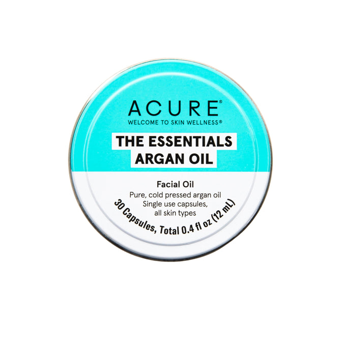 The Essential Argan Oil Capsules by Acure come in a turquoise and white circular tin. It contains 30 single-use capsules with pure, cold-pressed argan oil suitable for all skin types. Perfect for nourishing your facial needs, it offers a total of 0.4 fl oz (12 mL).