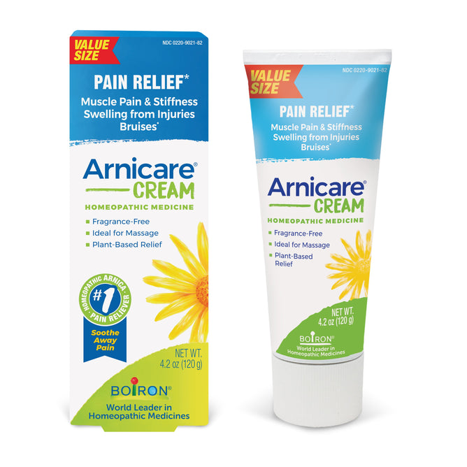 Box and tube of Boirons Arnicare Cream, a homeopathic remedy for muscle pain, stiffness, swelling, and bruises. The blue and white packaging with a yellow flower signifies a fragrance-free product.