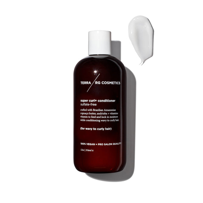 A dark brown bottle of Curl+ Conditioner by Terra Beauty Bars, featuring a white cap, sits next to a dollop of conditioner. The label showcases its sulfate-free, vegan formula with Brazilian superfoods for conditioning wavy to curly hair.