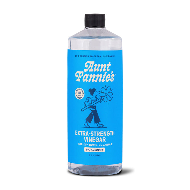 Aunt Fannies Extra Strength Vinegar: For Cleaning comes in a clear 32 fl oz bottle with 6% acidity, featuring a blue label and an illustration of a person with a mop. Ideal for DIY home cleaning, it excels at descaling and buildup removal.