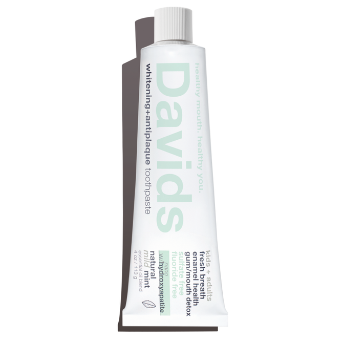 Davids Kids+Adults with nano-hydroxyapatite Toothpaste features a fluoride-free formula, natural ingredients and flavors, and super clean benefits. Its perfect for the vegan conscious family and comes in white packaging with light green text.