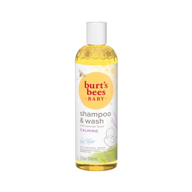 Burts Bees Baby Shampoo & Wash Calming, adorned with a honeycomb pattern and lavender and bee illustrations, offers a gentle lavender baby wash in a soothing 354 mL (12 fl oz) bottle.