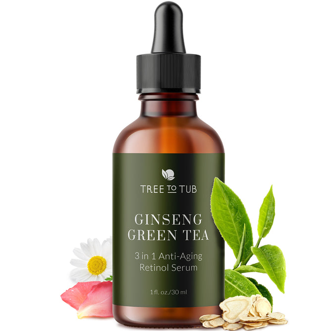 A dark amber dropper bottle labeled Anti Aging Green Tea, Hyaluronic & Retinol Serum for Face is surrounded by green leaves, white and pink flowers, and oat flakes. Ideal for sensitive skin, the brand name Tree To Tub is prominently displayed on the bottle.