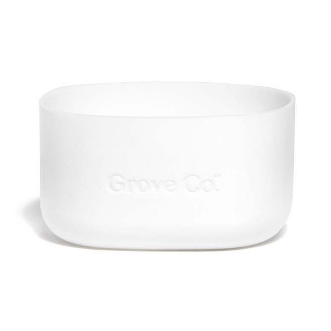 This white, rectangular Grove Co. container features rounded corners and is embossed with the brand name. Its an elegant reusable glass hand soap dispenser, blending style and practicality seamlessly. Known as the Silicone Sleeve - Glass Gel Hand Soap Dispenser, it exemplifies versatile elegance.