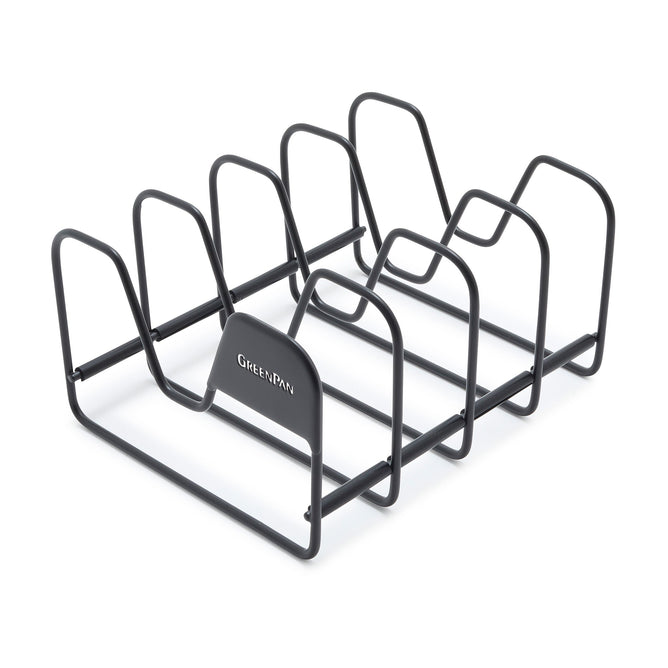 The GreenPan Pot Lid Organizer is a black metal rack with five slots designed for vertical cookware storage. Its minimalist design keeps your kitchen tidy by organizing lids effortlessly, featuring a small logo on the side.
