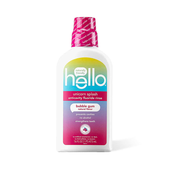 The hello Unicorn Mouthwash for kids, 473ml, has a white bottle with a gradient pink-to-blue label and bubble gum natural flavor. This alcohol-free anticavity fluoride rinse with cavity prevention features a pink safety seal on the cap for stronger teeth.