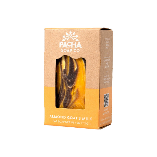 Box of Pacha Soap Co. Bar Soap with Almond Goats Milk, featuring a cutout that reveals the marbled brown and yellow soap, showcasing its nourishing blend along with the brand name and details—a perfect choice for nature-inspired skincare enthusiasts.
