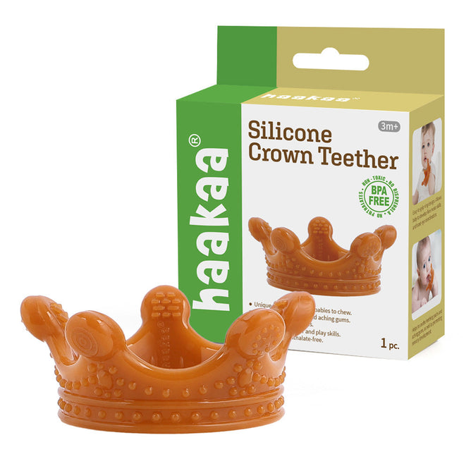 The Haakaa 100% Food Grade Silicone Sensory Development Crown Teether in brown, BPA-free, is ideal for babies aged 3 months and up, ensuring safe and stimulating playtime with its charming design.
