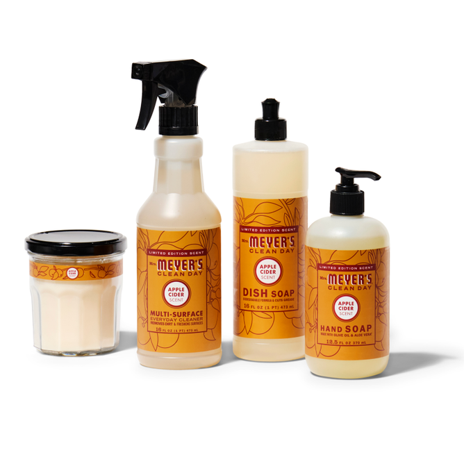 The Mrs. Meyers fall-freshen-up-set-mmcd features four Apple Cider scented products—a candle, multi-surface spray, dish soap, and hand soap—lined up on a white background.