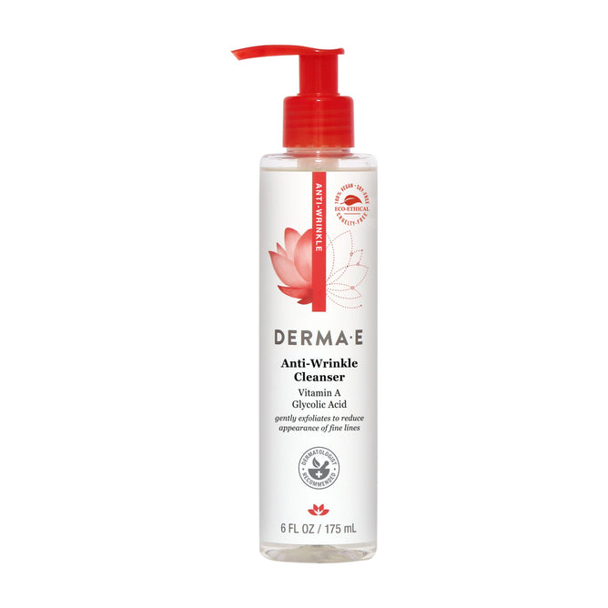 This 6 fl oz (175 ml) clear bottle of Derma E Anti-Wrinkle Cleanser features a red pump and label with a red lotus and text. Enriched with Vitamin A, glycolic acid, and papaya fruit extract.