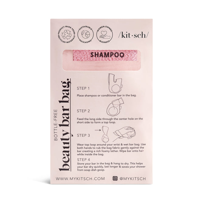 The Kitsch Soap Bar Bag showcases a pink shampoo bar in a handy hanging bag, perfect for streamlining your shower routine. It includes usage instructions and the brands social media handles, ensuring optimal airflow while keeping your essentials organized.
