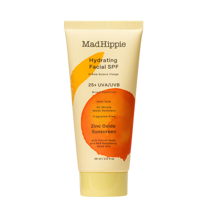 Mad Hippies Hydrating Facial - SPF 25, ideal for daily lotion and mineral SPF use, comes in vibrant yellow packaging with orange/red designs. Offering 25+ UVA/UVB protection, its reef safe, water-resistant, and enriched with carrot and red raspberry seed oils. Available in a 69ml tube.