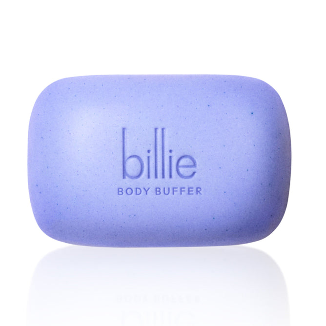 A rectangular, purple Body Buffer - Pre-shave Exfoliating Bar by billie features jojoba beads and the engravings billie and BODY BUFFER on its smooth surface. The exfoliating soap is set against a white background.