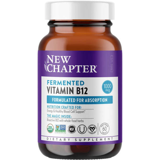 A brown New Chapter bottle of Fermented Vitamin B12 - For Cellular Energy + Healthy Blood Cells features a purple and white label, stating Formulated for Absorption, offering 1000 mcg of bioactive methylated B12, and displays non-GMO and vegan certification logos.