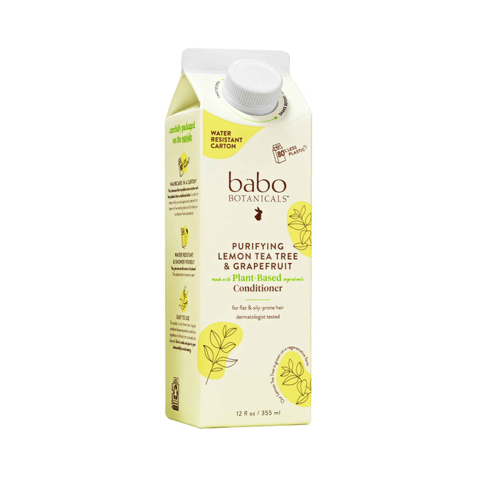 Babo Botanicals Purifying Conditioner for Flat, Oily Hair, ideal for a sustainable routine, features light-colored packaging with leaf and fruit illustrations. Its a lightweight, plant-based formula thats dermatologist-tested for flaky-prone hair.