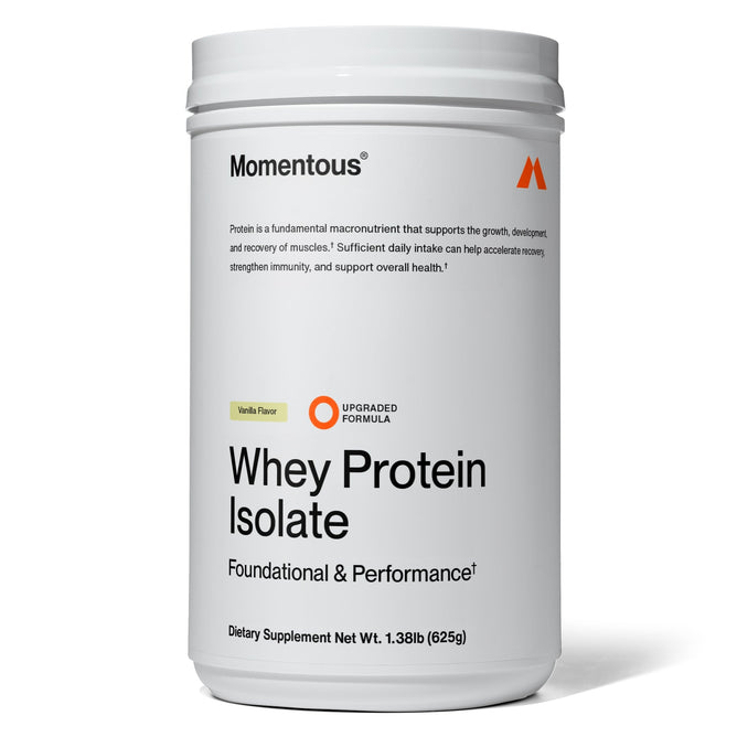 Momentous Grass Fed Whey Protein Isolate comes in a white container featuring an improved vanilla formula. Sourced from grass-fed dairy cows, it emphasizes foundational and performance benefits with added ProHydrolase. Net weight: 1.38 lb (625g).