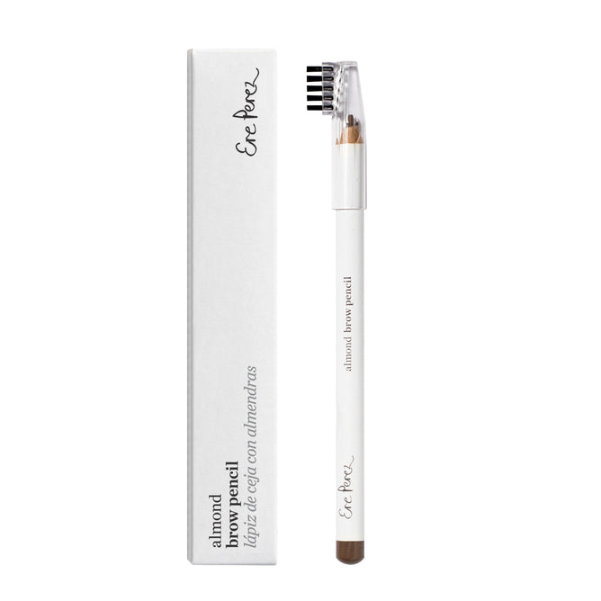 Ere Perezs Almond Brow Pencil features a nourishing almond oil formula, a white body with a brown tip, and a spoolie brush on the cap. It comes in sleek packaging with cursive branding for elegance, alongside its matching box.