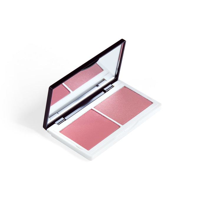 Lily Lolos Cheek Duo is an open makeup compact with two pink blush shades made from natural ingredients. It features a mirror inside the lid and comes in a sleek, rectangular white palette with a black frame. The white background highlights its clean beauty appeal.