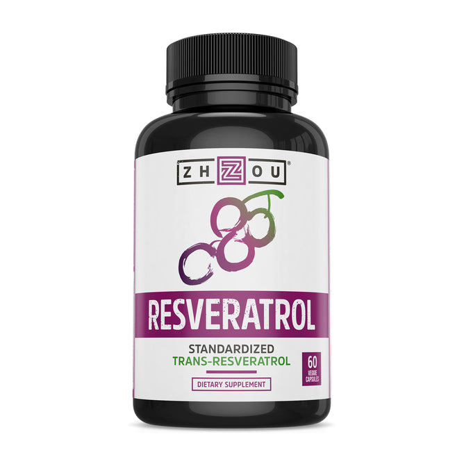A bottle of Zhou Nutritions Resveratrol dietary supplement comes in a black bottle with a white label, red text, and grape graphic. It contains 60 vegetable capsules of trans-resveratrol for cardiovascular support and antioxidant flavonoids for overall wellness.