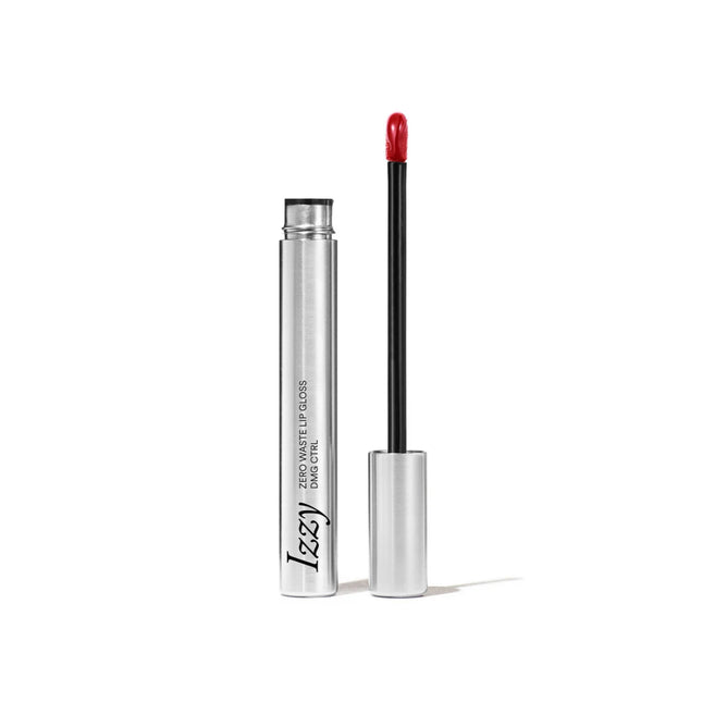 The silver cylindrical tube of IZZY Zero Waste Beautys refillable Lip Gloss is open, with a red applicator wand beside it. The vibrant red gloss stands out against the white background, embodying stylish and sustainable beauty.