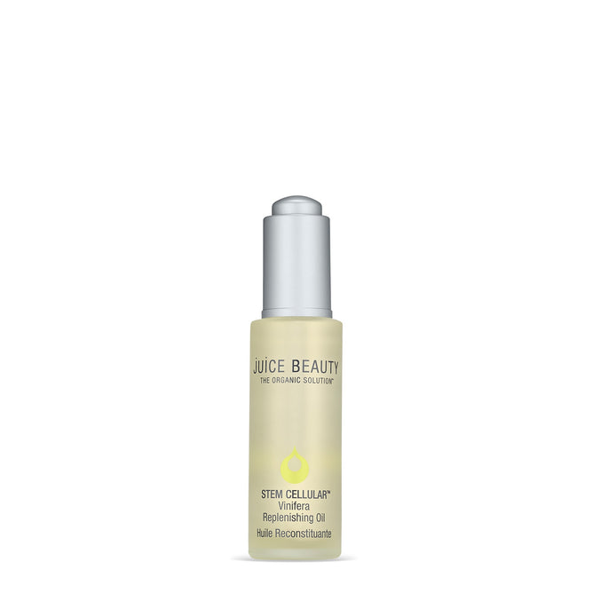 A bottle of Juice Beauty Stem Cellular Vinifera Replenishing Oil + Primer with a silver cap features the brand and product details in light green and black on a white label—an ideal addition to your daytime primer routine.