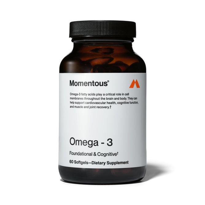 A bottle of Momentous Omega-3 supplement contains 60 softgels, highlighting Omega-3 benefits for cardiovascular health, cognitive function, and muscle recovery.