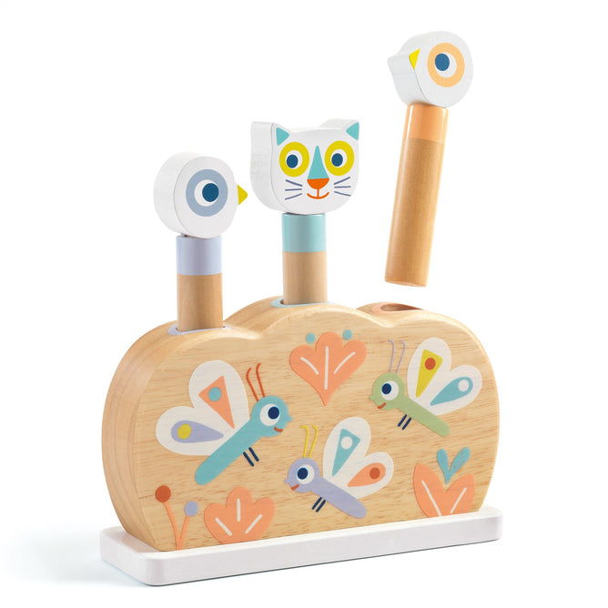 The DJECO Baby Popi Pop-Up Puzzle Toy, crafted from FSC® Certified Wood, features animal heads on pegs: a cat, bird, and owl. The natural finish base has vibrant butterfly and heart designs. Each peg is uniquely colored in blue, pink, or orange to encourage motor skills development through creative play.