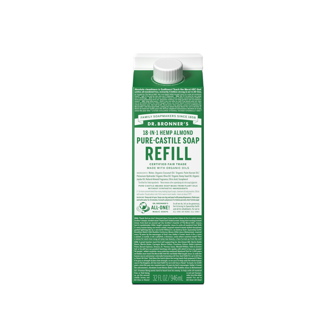 The Dr. Bronners Pure-Castile Liquid Soap Refill Carton features eco-friendly packaging, highlights its organic and fair-trade ingredients, and contains 32 fl oz (946 ml) of soap. The green and white rectangular carton has a white cap.