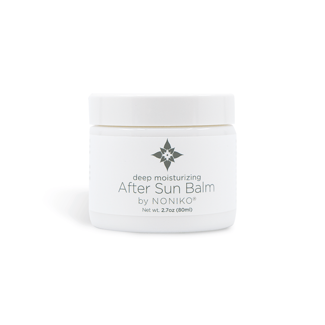 The NONIKO® After Sun Balm comes in a white jar with a floral logo. This hydrating balm contains 2.7 oz (80 ml) of product and is designed to rehydrate and soothe skin after sun exposure.