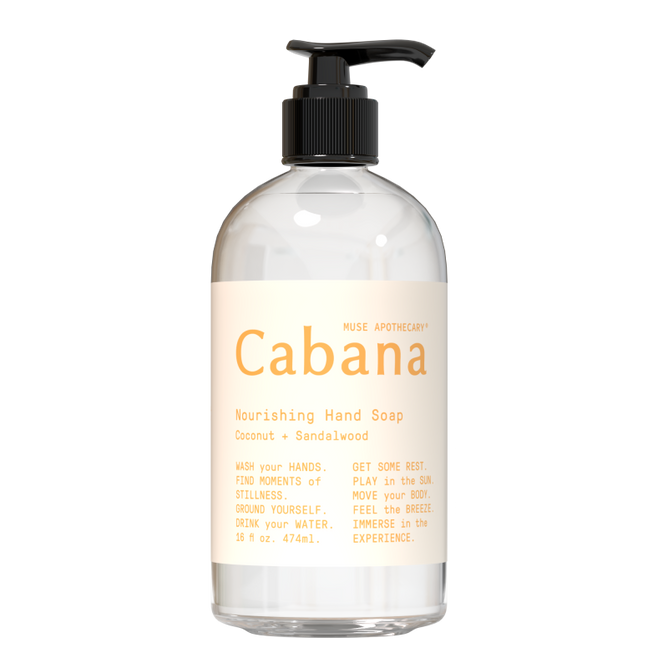 The Muse Apothecary Nourishing Hand Soap in a clear pump bottle offers a tropical coconut and sandalwood scent, with notes of pineapple and ocean salt, creating moments of stillness while inspiring balance and vitality.