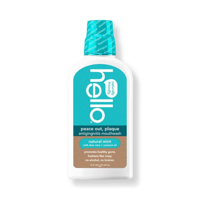 A white bottle of hellos Peace Out, Plaque Mouthwash in natural mint flavor promises fresh breath and vibrant oral health with aloe vera and coconut oil. It features a teal label and cap, promoting healthy gums.